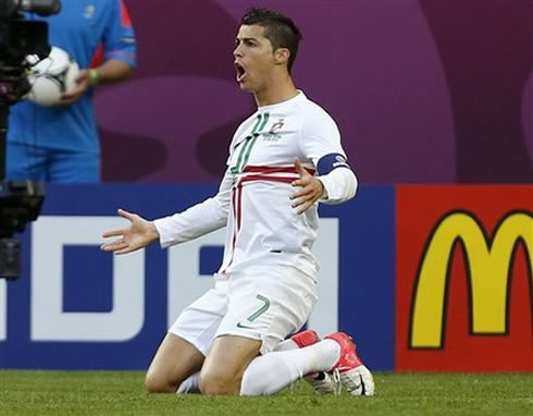 Cristiano Ronaldo on his knees screaming at the referee at the EURO 2012