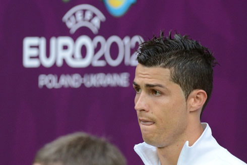 Cristiano Ronaldo licking his lips with his tongue, right before the match between Portugal and Denmark for the EURO 2012