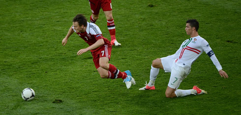 Cristiano Ronaldo fouling a Danish player in the EURO 2012