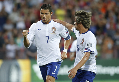 Cristiano Ronaldo celebrates his goal for Portugal with Fábio Coentrão