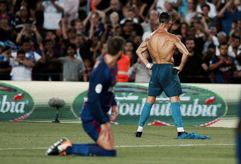 Cristiano Ronaldo takes his shirt off after scoring against Barcelona in El Clasico for the Spanish Super Cup in 2017
