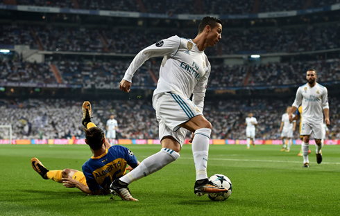Cristiano Ronaldo dribbles an opponent and leaves him on the ground