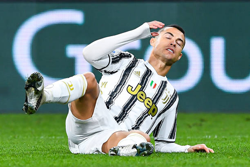 Cristiano Ronaldo layed on the ground after suffering a foul