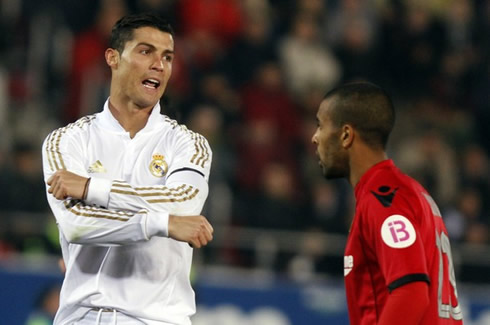 Cristiano Ronaldo crosses his arms in disagreement in a Real Madrid game in 2012