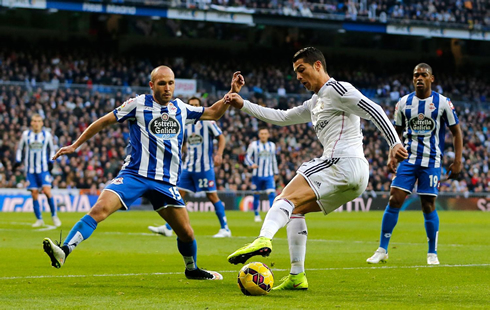 Cristiano Ronaldo tricking a defender by pulling the ball back with his left boot, in Real Madrid vs Deportivo La Coruña