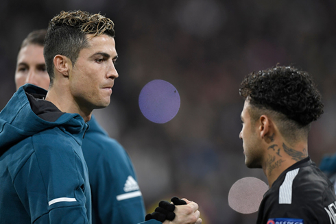 Cristiano Ronaldo and Neymar looking each other in the eyes