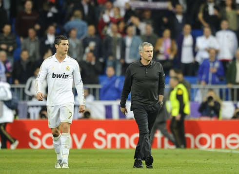 Cristiano Ronaldo walks away from the Santiago Bernabéu, after a Real Madrid game, side by side with José Mourinho