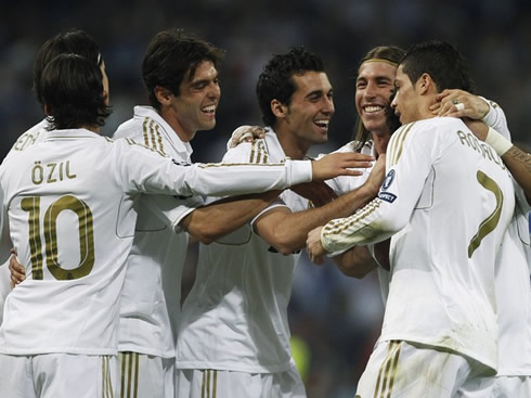 Cristiano Ronaldo with Sergio Ramos, Arbeloa, Kaká, and Mesut Ozil, celebrating goal against CSKA Moscow