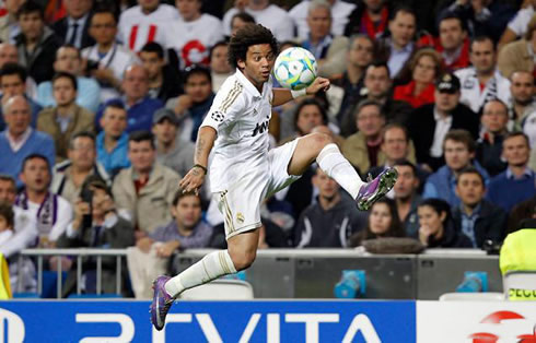 Marcelo controlling a long pass in the air