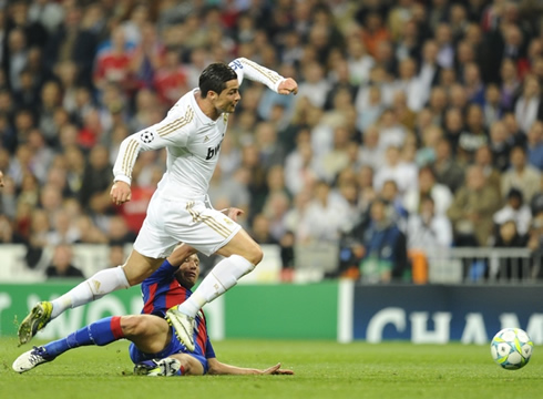 Cristiano Ronaldo takes off and gets tackled by a Russian defender from CSKA Moscow