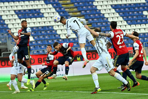 Cristiano Ronaldo raises in the air to head the ball and score for Juventus