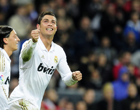 Cristiano Ronaldo smiling to his girlfriend and family in the Santiago Bernabéu crowd