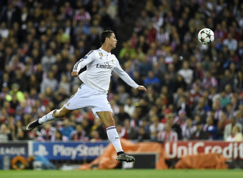 Cristiano Ronaldo heading the ball in the air