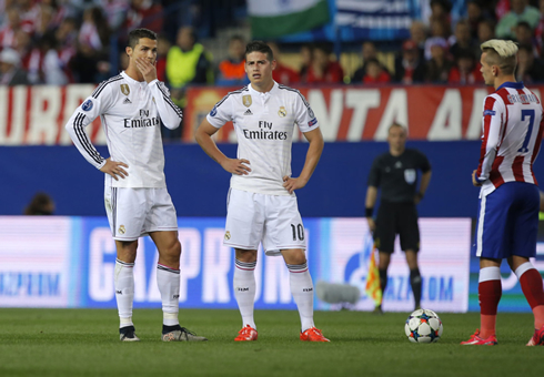 Cristiano Ronaldo and James Rodríguez looking worried