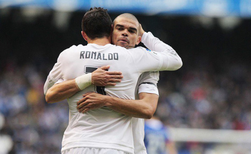 Cristiano Ronaldo hugging Pepe in a match between Deportivo and Real Madrid
