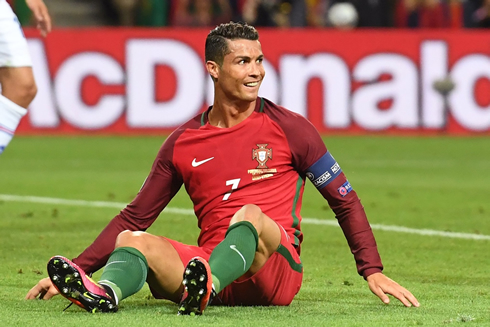 Cristiano Ronaldo sits down on the ground in Portugal 1-1 Iceland for the EURO 2016
