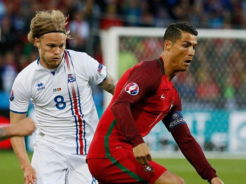 Cristiano Ronaldo trying to escape his marking in Portugal vs Iceland for the EURO 2016 debut