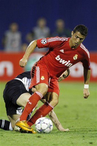 Cristiano Ronaldo getting past a defender in the UEFA Champions League match against Dinamo Zagreb