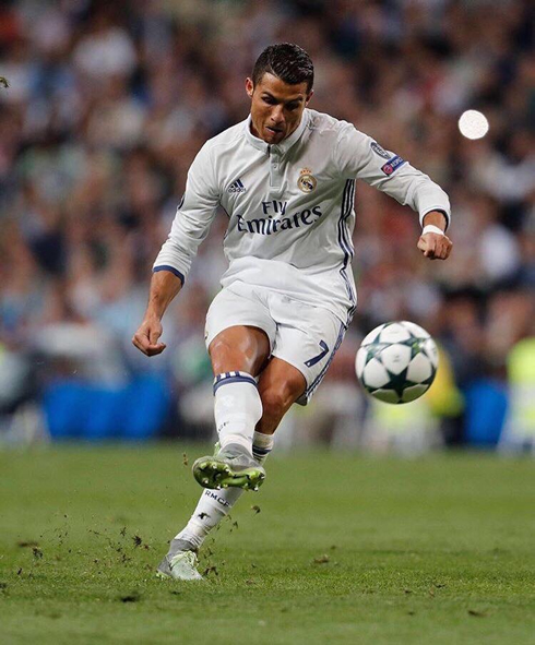 Cristiano Ronaldo striking the ball on a free-kick situation