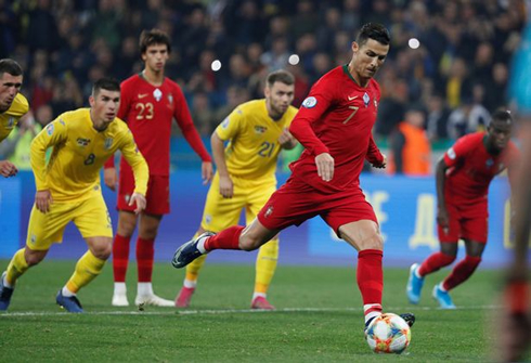 Cristiano Ronaldo converting a penalty-kick for Portugal, to score his 700th career goal
