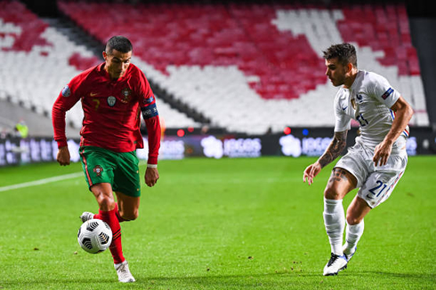 Cristiano Ronaldo running down the wing the ball next to his feet