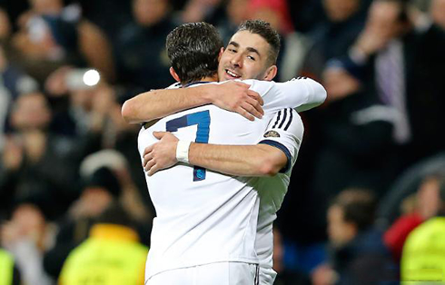 Cristiano Ronaldo hugging Karim Benzema, in Real Madrid goal celebrations against Valencia, for the Copa del Rey 2013