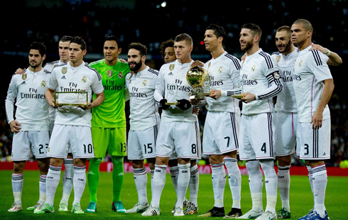 Cristiano Ronaldo and his Real Madrid teammates taking a photo with the 2014 FIFA Ballon d'Or in front of their fans at the Santiago Bernabéu