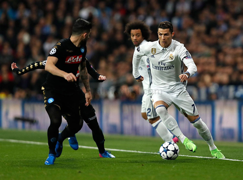 Cristiano Ronaldo taking on a defender in Real Madrid 3-1 Napoli, for the Champions League in 2017