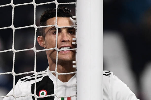 Cristiano Ronaldo biting the net
