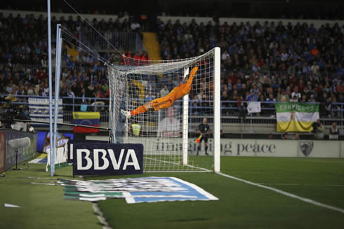 Cristiano Ronaldo hanging on the crossbar