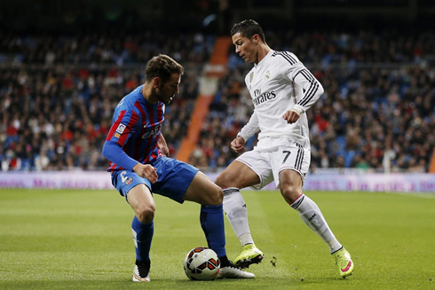 Cristiano Ronaldo trying to nutmeg a Levante defender, in a Real Madrid league fixture in 2015