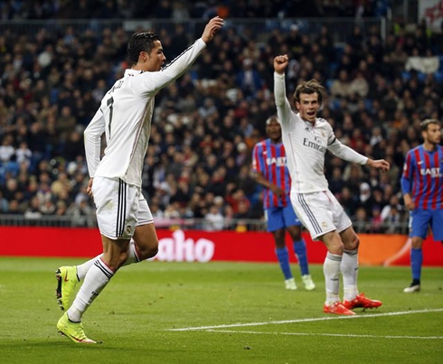 Cristiano Ronaldo raises his hand to celebrate Real Madrid goal, before realizing it would be credited to Gareth Bale