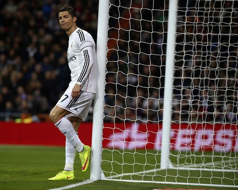 Cristiano Ronaldo leans against the post, during a Real Madrid game for La Liga 2014-2015