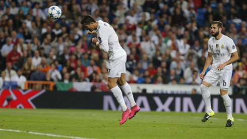 Cristiano Ronaldo scores his third goal of the game from a rebound header, in Real Madrid 4-0 Shakhtar Donetsk