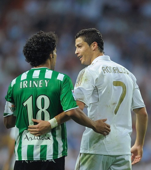 Cristiano Ronaldo laughs while talking to Betis player, Iriney, in La Liga 2011/2012