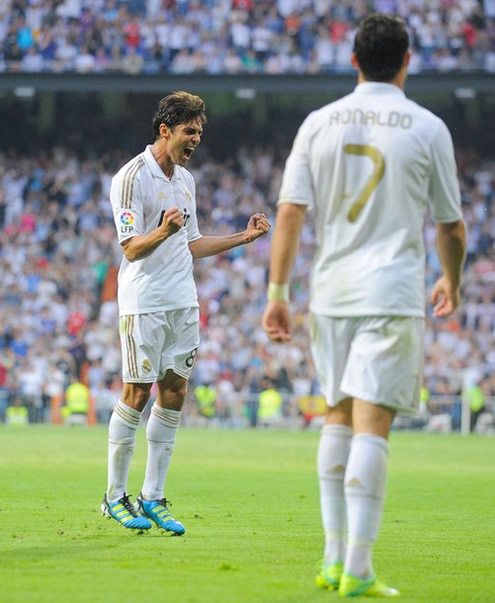 Ricardo Kaká shows all his joy after scoring another goal for Real Madrid, while Cristiano Ronaldo slowly walks towards him to congratulate him