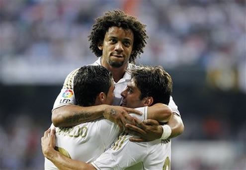 Cristiano Ronaldo team hug with his Marcelo and Kaká, in a Real Madrid game