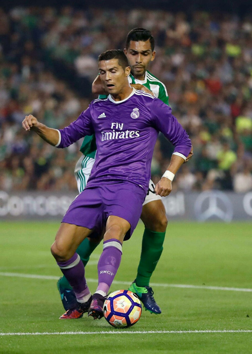 Cristiano Ronaldo being pushed on his back, in Betis vs Real Madrid for La Liga 2016-17