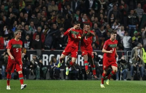 Cristiano Ronaldo celebrating with Nani in NBA style, by jumping high and pushing each other in the air