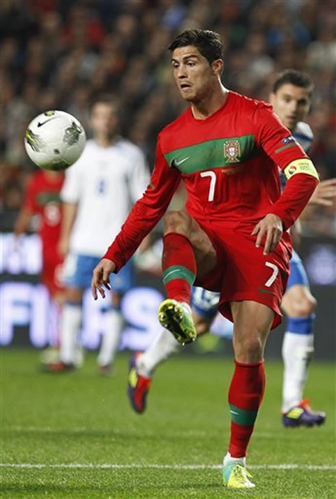 Cristiano Ronaldo controlling the ball and with a new hair style