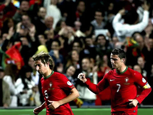 Cristiano Ronaldo and Fábio Coentrão, after celebrating Portugal vital goal against Sweden