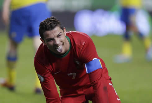 Cristiano Ronaldo sticking his tongue out showing off his exhaustion, in Portugal vs Sweden