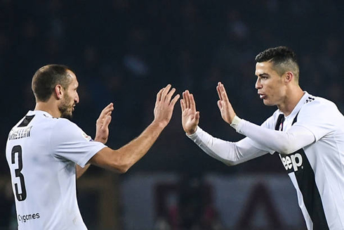 Giorgio Chiellini and Cristiano Ronaldo motivating each other in a Juventus game