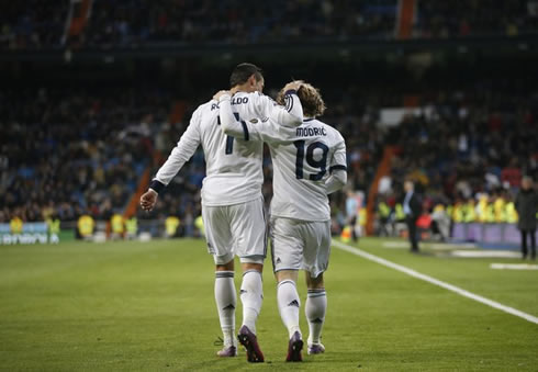 Cristiano Ronaldo and Mesut Ozil greet each other during Real Madrid vs Mallorca, in the Spanish League 2012-2013