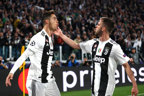 Pjanic and Cristiano Ronaldo celebrating Juventus home goal against Ajax