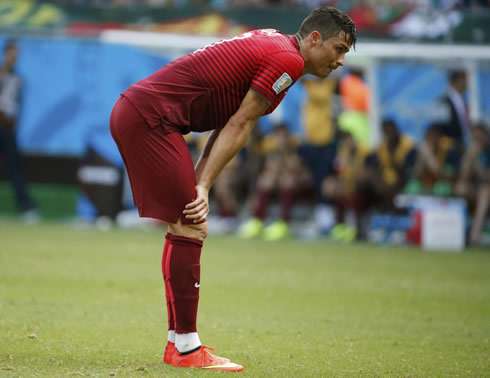 Cristiano Ronaldo leans on his knees, during Germany 4-0 Portugal for the FIFA World Cup 2014
