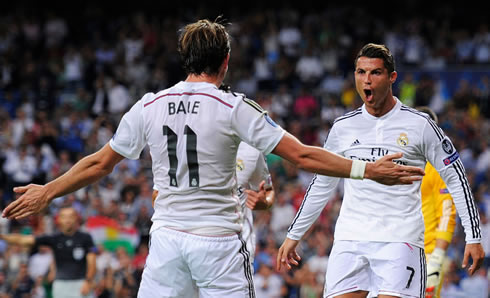 Gareth Bale waiting for a hug from Cristiano Ronaldo, in the UEFA Champions League 2014-2015