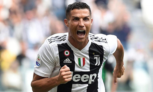 Cristiano Ronaldo roars in celebration as he scores his first goal in Juventus