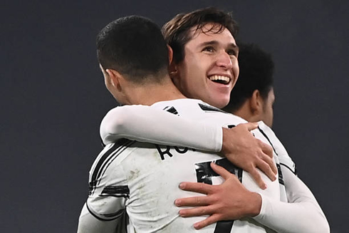 Chiesa hugging Cristiano Ronaldo after a goal for Juventus