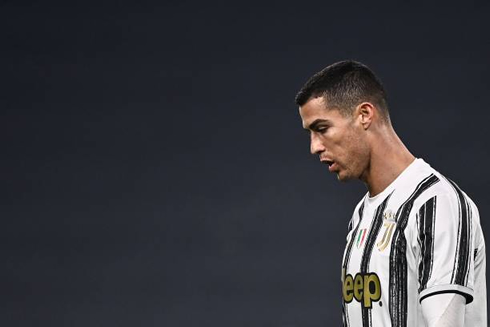 Cristiano Ronaldo looking down and thinking about his future